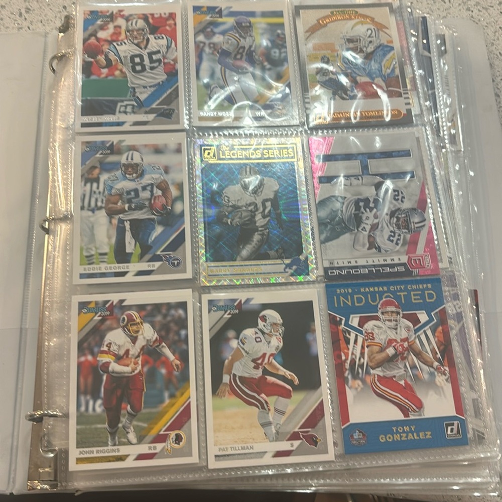 Football carss binder included over $100 worth of cards